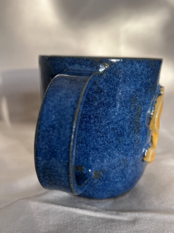 kubek ceramiczny granatowy z żółtym dolarem